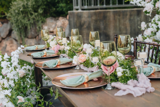 Beautiful table scape with color scheme of sage green and rose gold 